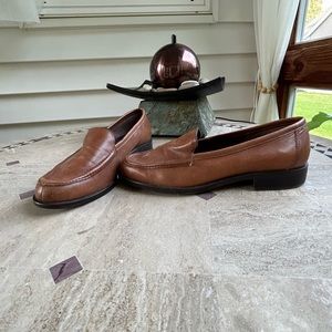 Brown leather flats